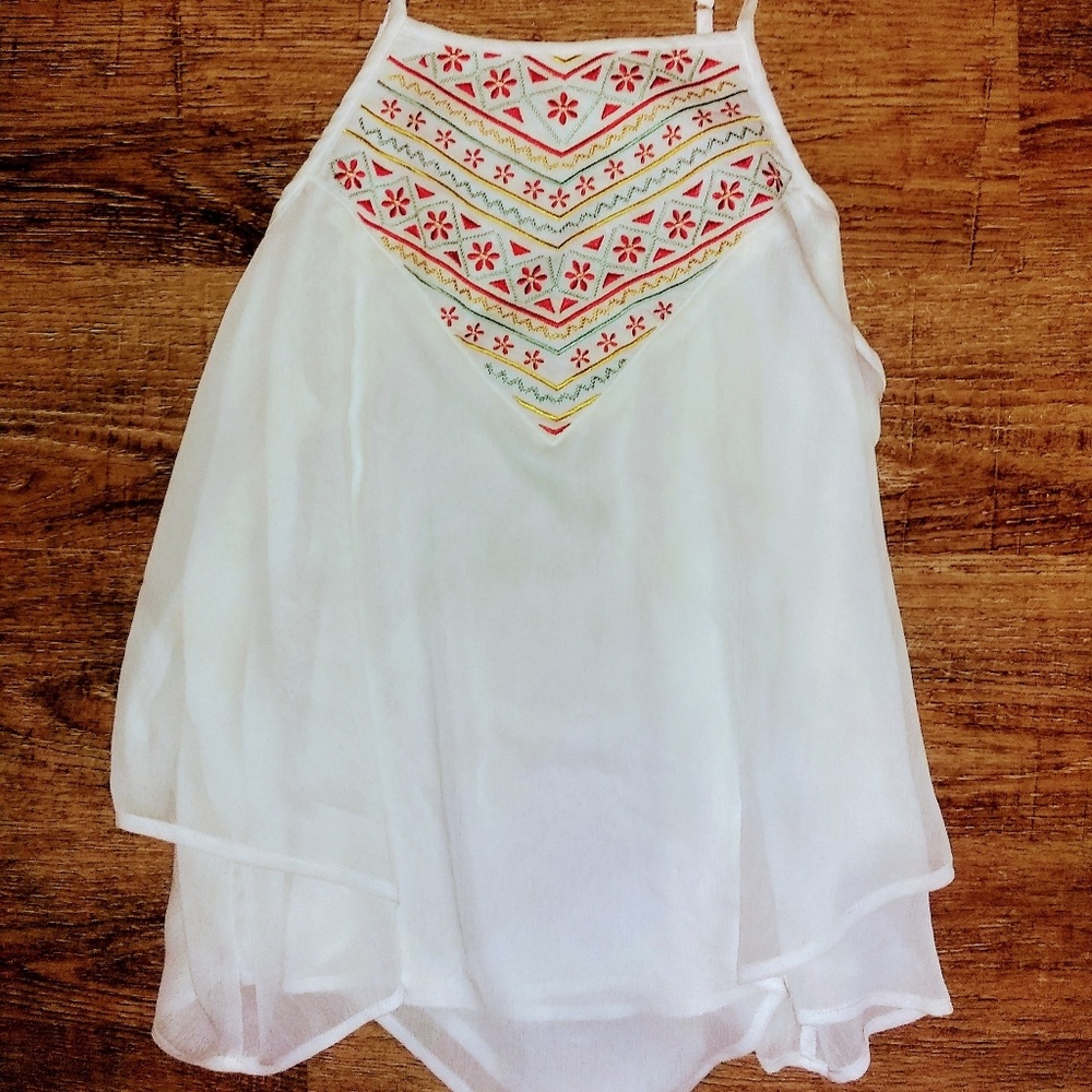 White tank with earrings